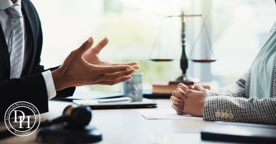 Meeting, lawyers and hands of business people in office for legal consultation, contract and discussion. Corporate, professional and workers with gavel for legislation, agreement and deal at law firm